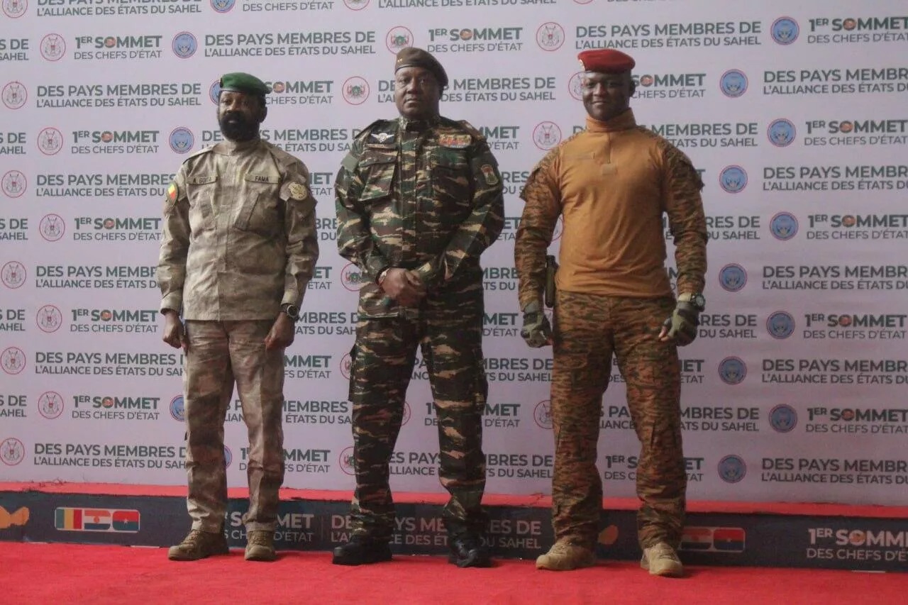 Heads of state of Malis Assimi Goita, Nigers General Abdourahamane Tiani and Burkina Fasos Captain Ibrahim Traore pose for photographs during the first ordinary summit of heads of state and governments of the Alliance of Sahel States (AES) in Niamey, Niger July 6, 2024. REUTERS/Mahamadou Hamidou