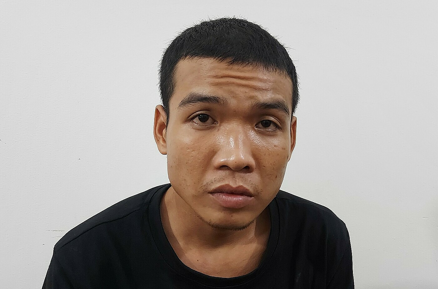 Hiệp tại cơ quan điều tra. Ảnh: Phước Thanh