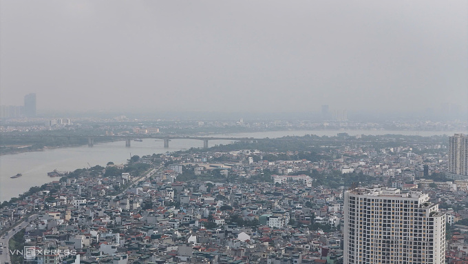 64059ad0d1126a4c3303-173191015-3518-7417-1731910207 Bầu trời hai bên bờ sông Hồng đoạn quận Long Biên và Hai Bà Trưng. Ảnh: Phạm Chiểu