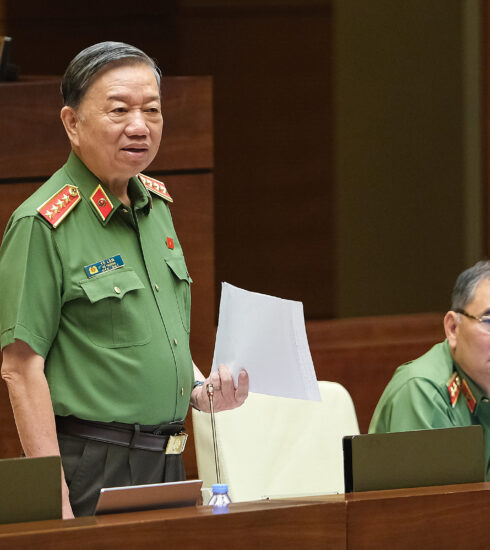 Bộ trưởng Công an Tô Lâm trả lời chất vấn tại phiên họp thứ 14 của Ủy ban Thường vụ Quốc hội, tháng 8/2022. Ảnh: Media Quốc hội