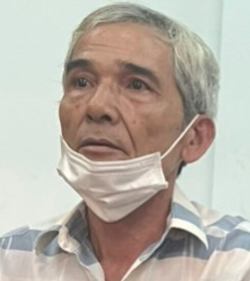 Dũng thời điểm bị bắt. Ảnh: Thái Hà