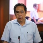 Ông Nguyễn Văn Lâm trả lời tại buổi họp báo, chiều 18/5. Ảnh: Lê Tuyết