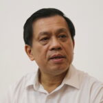 Thứ trưởng Nguyễn Bá Hoan trả lời VnExpress. Ảnh: Đình Văn