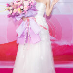 Phương Nhi mặc đầm tôn dáng của Lê Thanh Hòa tại sự kiện. Ảnh: Sen Vàng