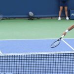 Djokovic (phải) mắc nhiều lỗi khiến anh và đồng đội Cacic bị loại sớm ở nội dung đôi nam tại Cincinnati. Ảnh: ATP