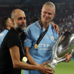 Guardiola và Haaland chia vui sau khi đoạt Siêu Cup châu Âu. Ảnh: Reuters