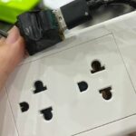 Ổ điện trong nhà tắm của hai nữ sinh gắn camera. Ảnh: Hoàng Phong