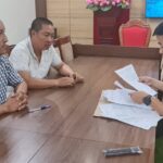 Trần Văn Tuấn và Hoàng Ánh Cương tại Cơ quan Công an. Ảnh Công an cung cấp