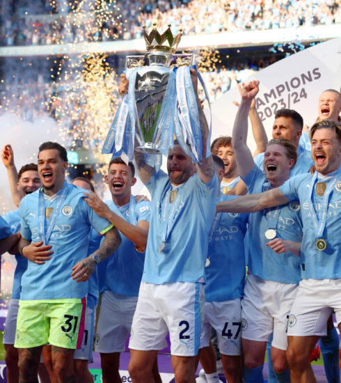 Man Ciity mừng Ngoại hạng Anh 2023-2024 hồi tháng 5 tại sân Etihad. Ảnh: Reuters